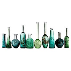 Ten Green Bottles, mixed green glass installation by Louis Thompson