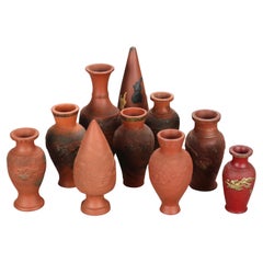 Ten Japanese Embossed Terra Cotta Vases C1930