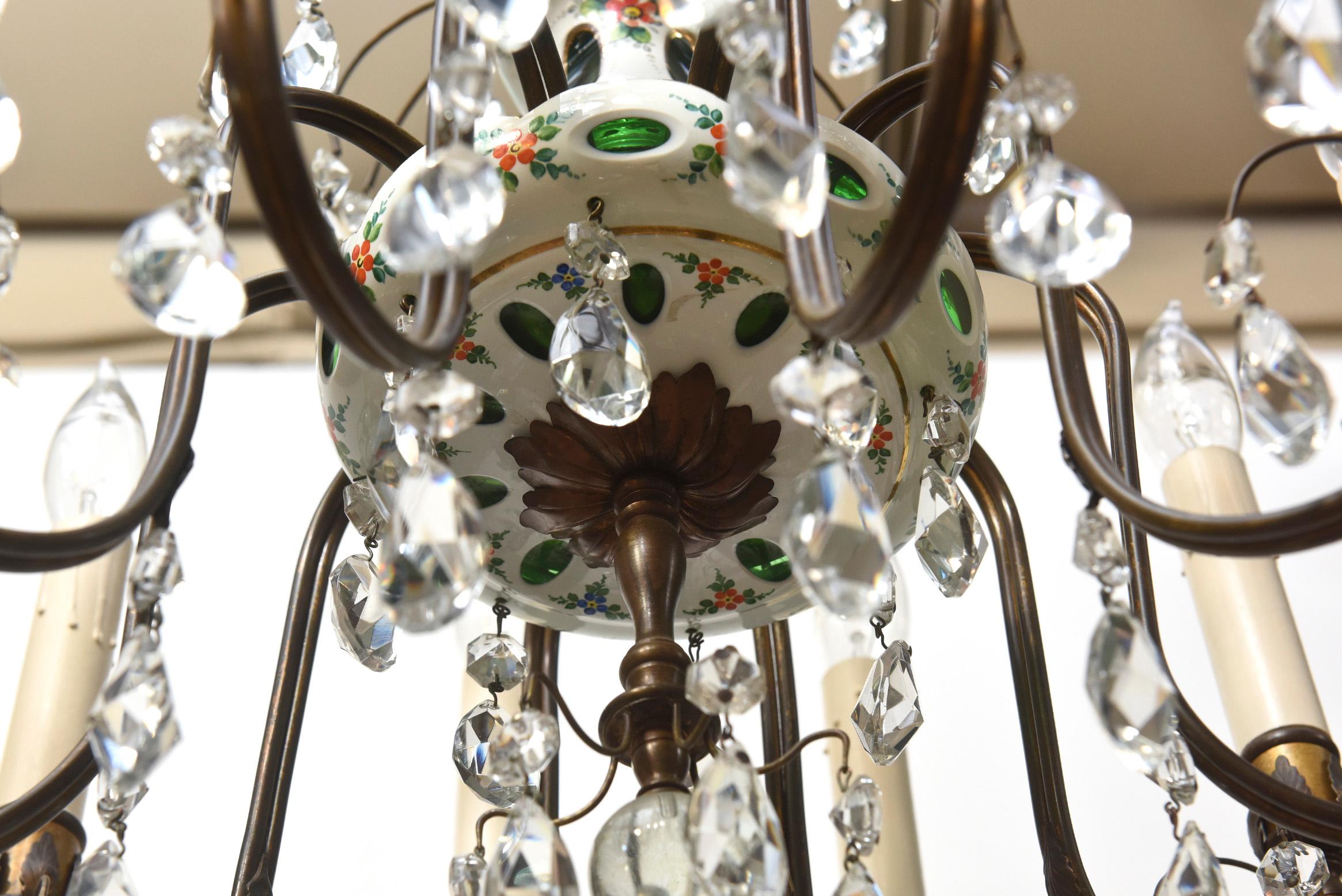 Ten light chandelier. Hand painted overlay glass with crystals. Czechoslovakia, early 20th Century

Dimensions: 
Height: 24