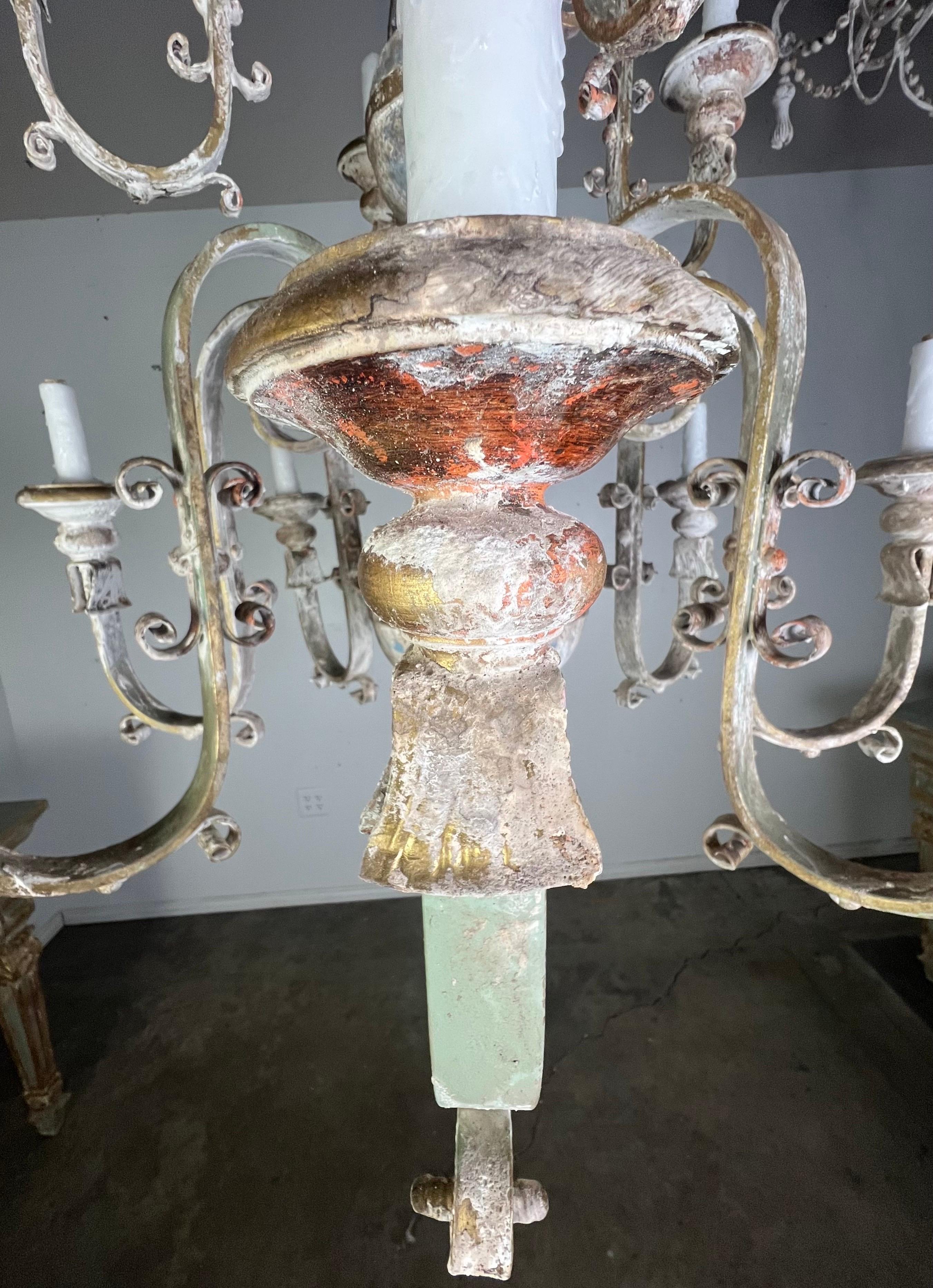 Mid-20th Century Ten Light Spanish Wrought Iron & Wood Painted Chandelier For Sale
