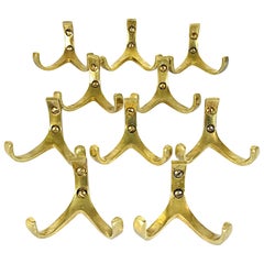 Ten Midcentury Hertha Baller Brass Wall Coat Hooks, 1950s, Austria Ten Midcentury Hertha Baller Brass Wall Coat Hooks, 1950s, Austria