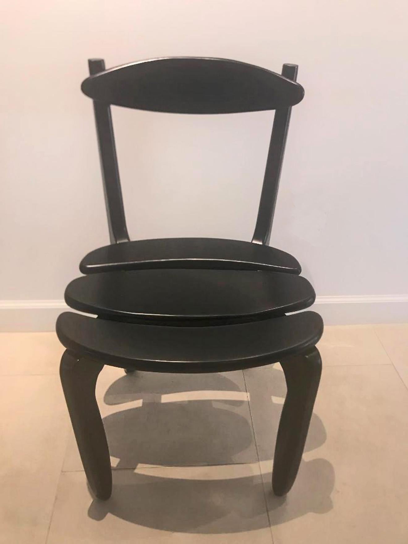Suite of ten black stained oak dining room chairs.
Guillerme and Chambron
Edition Votre Maison.