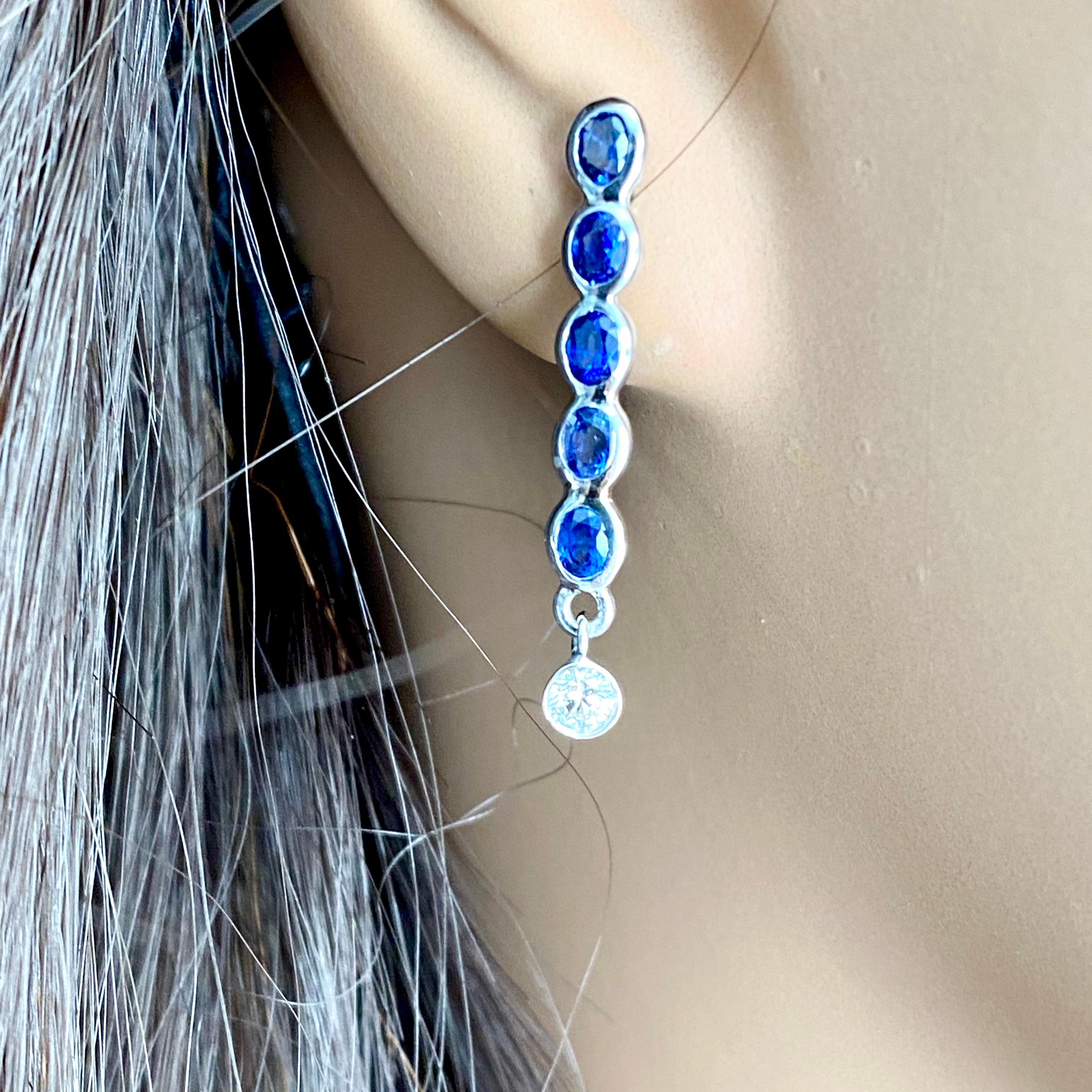Ten Oval Shaped Sapphire Drop and Two Diamonds Linear White Gold Drop Earrings 4