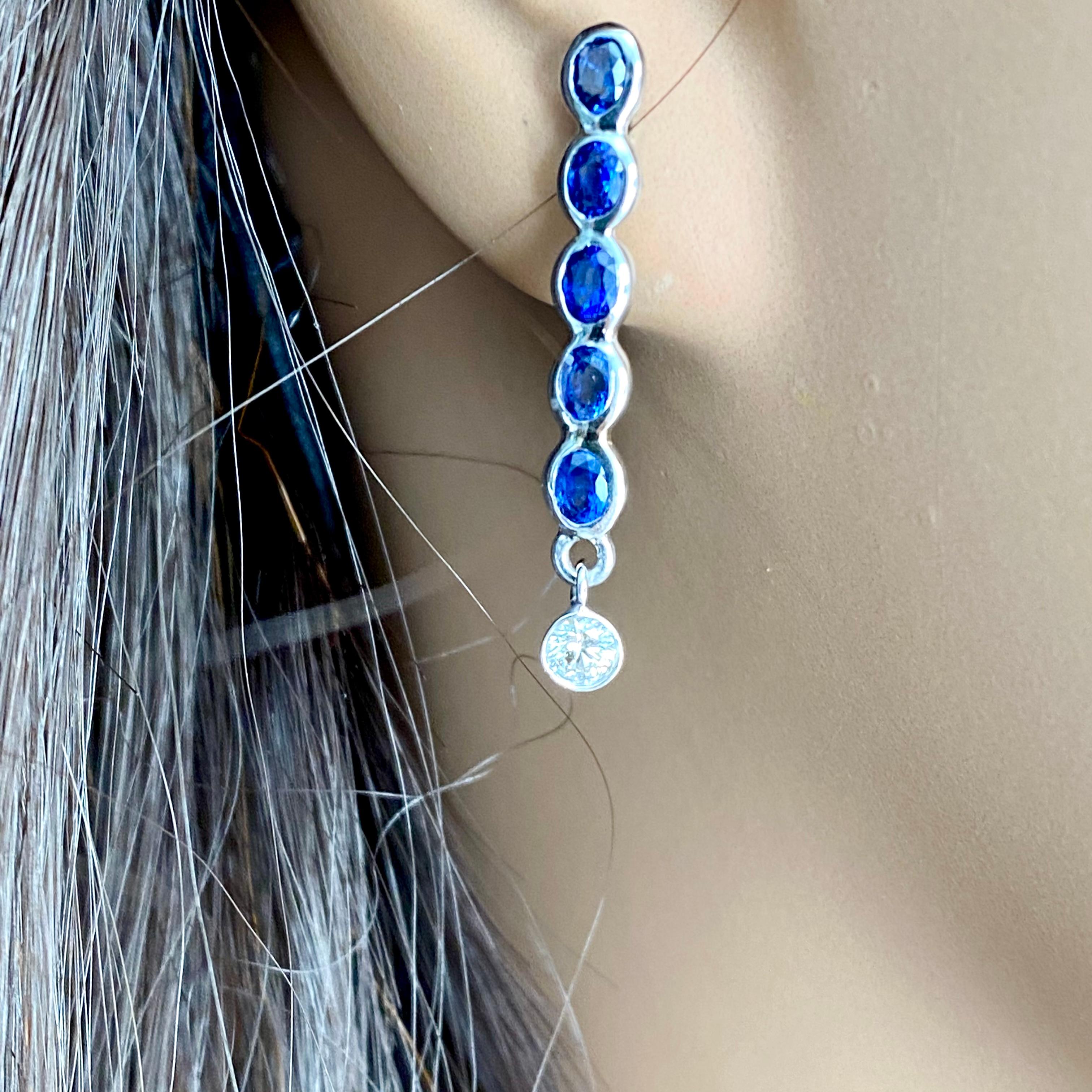 Ten Oval Shaped Sapphire Drop and Two Diamonds Linear White Gold Drop Earrings 5
