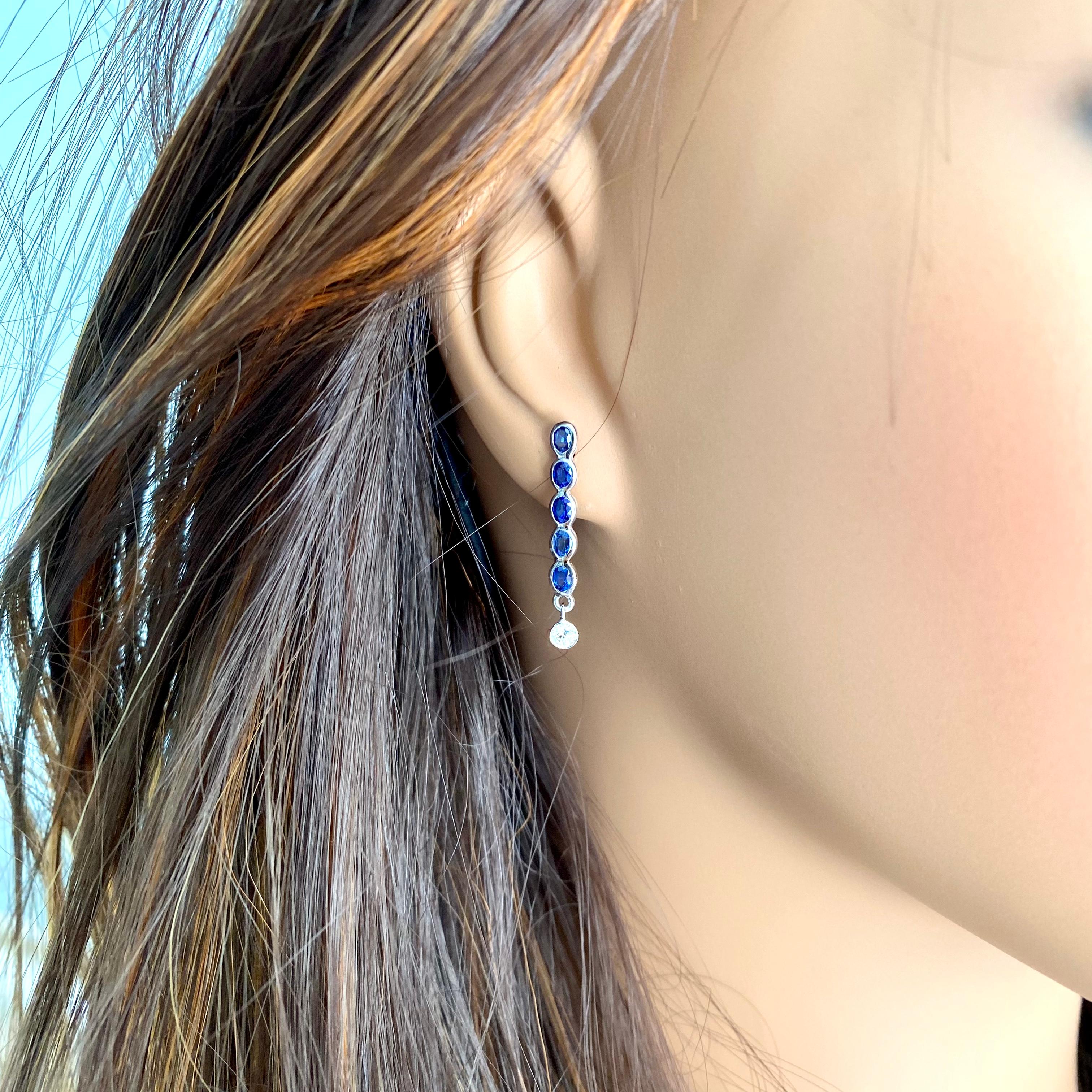 Ten Oval Shaped Sapphire Drop and Two Diamonds Linear White Gold Drop Earrings 6