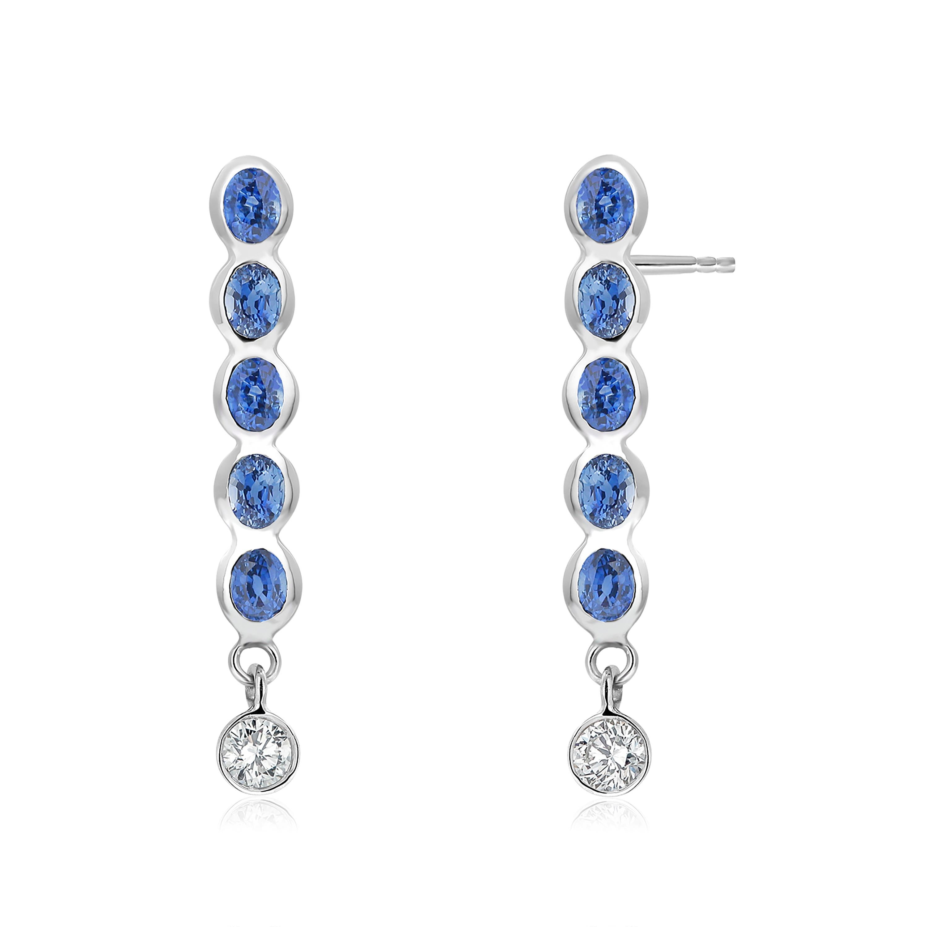 Contemporary Ten Oval Shaped Sapphire Drop and Two Diamonds Linear White Gold Drop Earrings