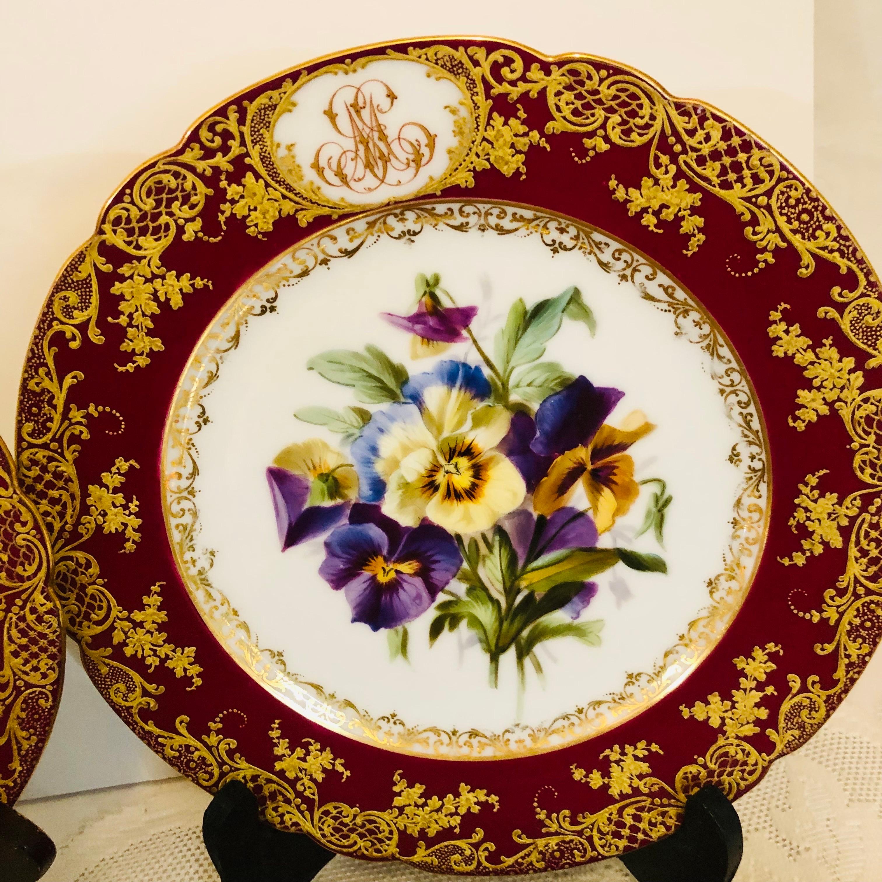 Français Dix assiettes en porcelaine de Paris peintes chacune avec des bouquets de fleurs et des fruits différents en vente