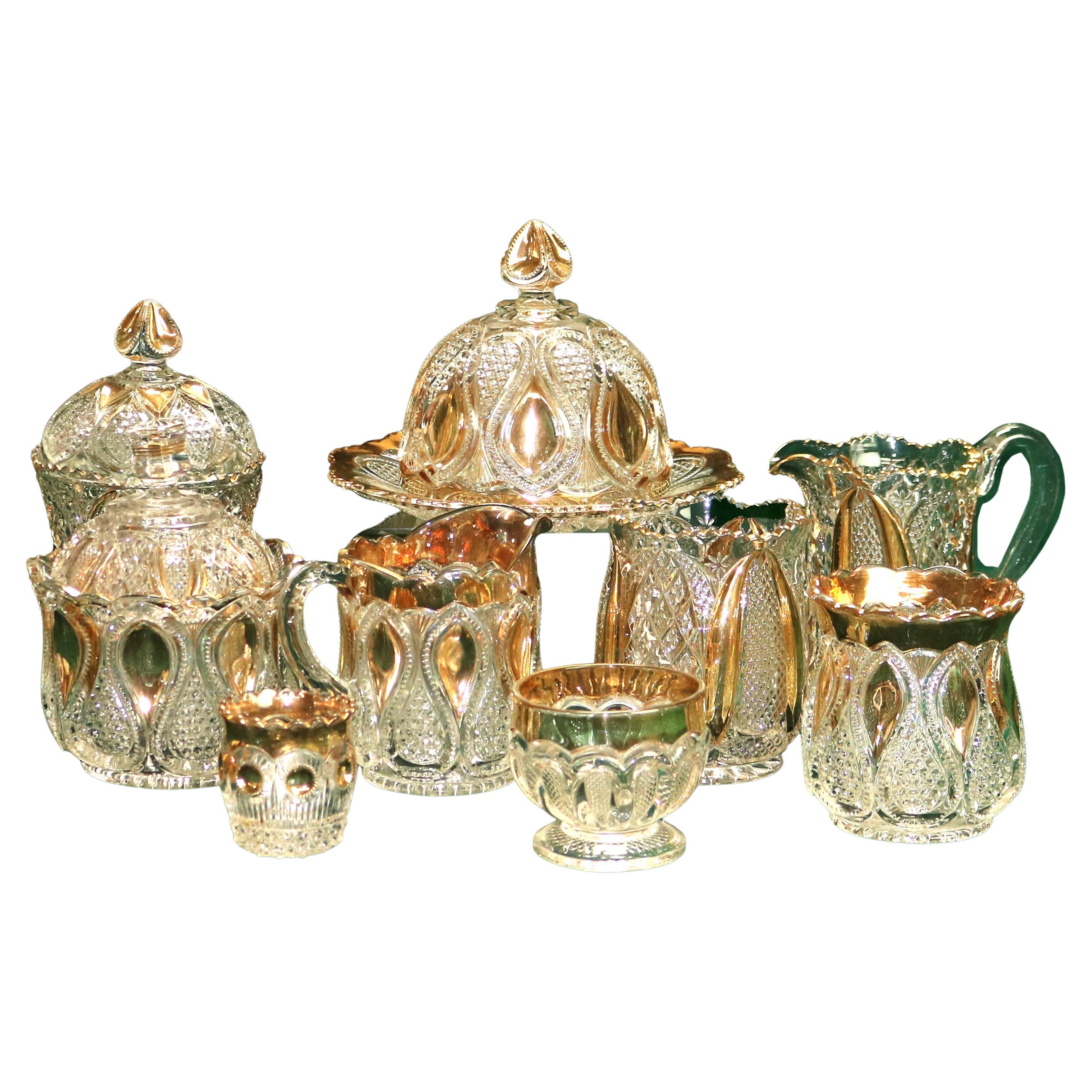 Vajilla antigua de diez piezas de vidrio prensado dorado C1930 en venta