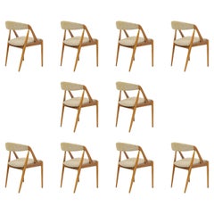 Dix chaises de salle à manger Kai Kristiansen restaurées, dont le rembourrage sur mesure est inclus