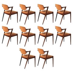 Ten Restored Kai Kristiansen Rosewood Dining Chairs Including Custom Upholstery