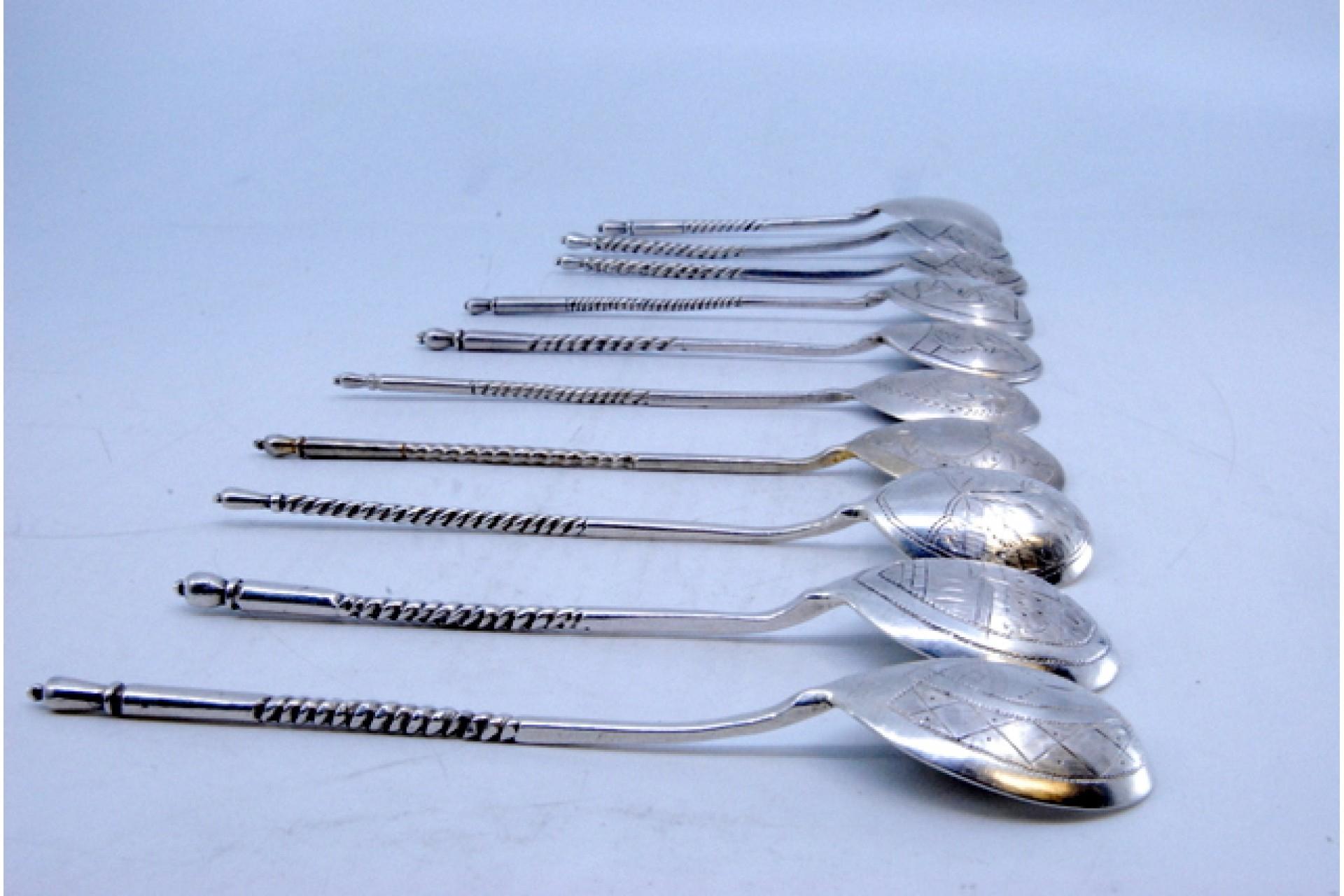 20th Century Ten silver dessert spoons with engraved shells and twisted Russian handles For Sale