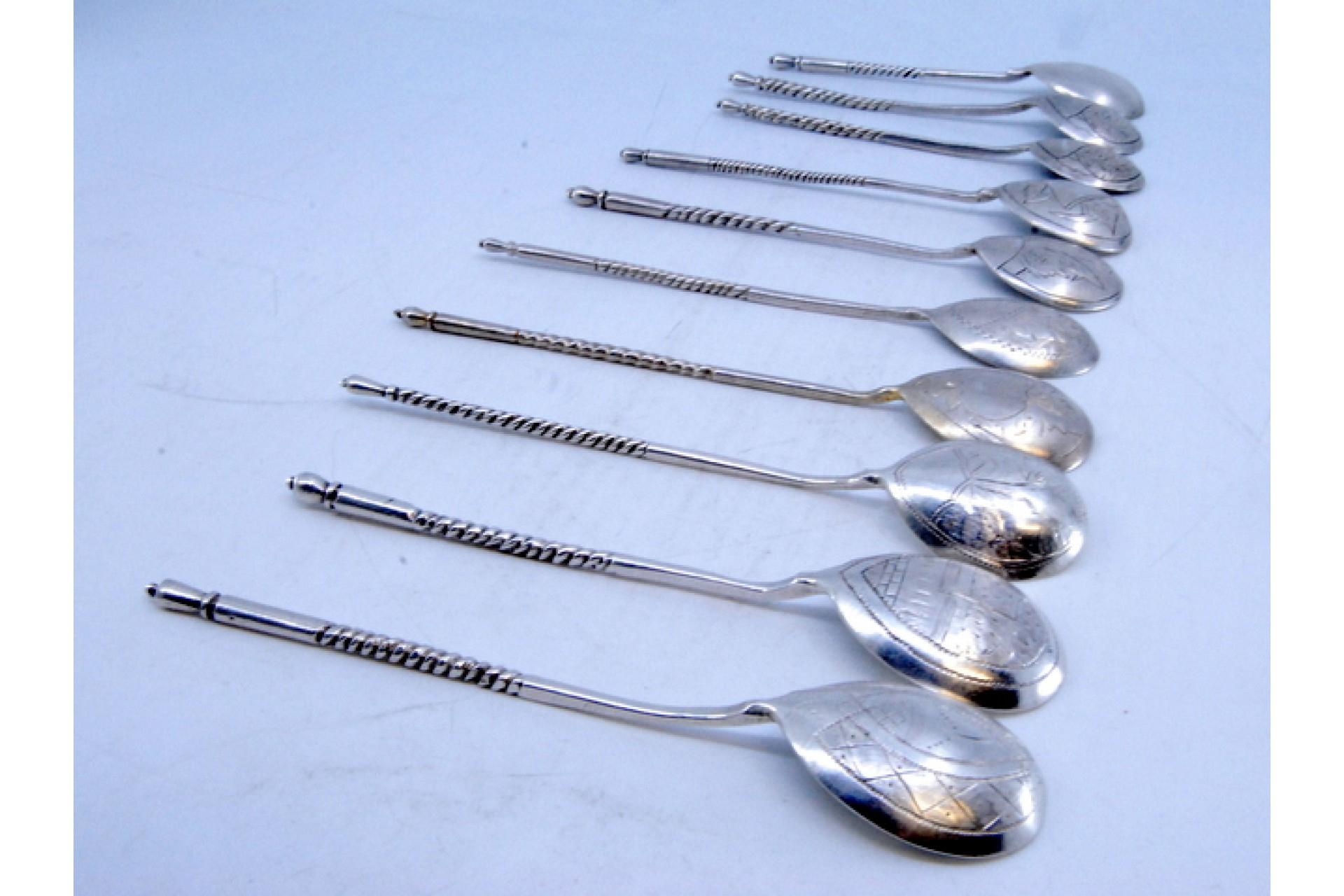 Silver Ten silver dessert spoons with engraved shells and twisted Russian handles For Sale