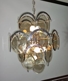 Ten Torchère Multi Smoked Beveled Glass Discs and Chrome Plate Frame Chandelier