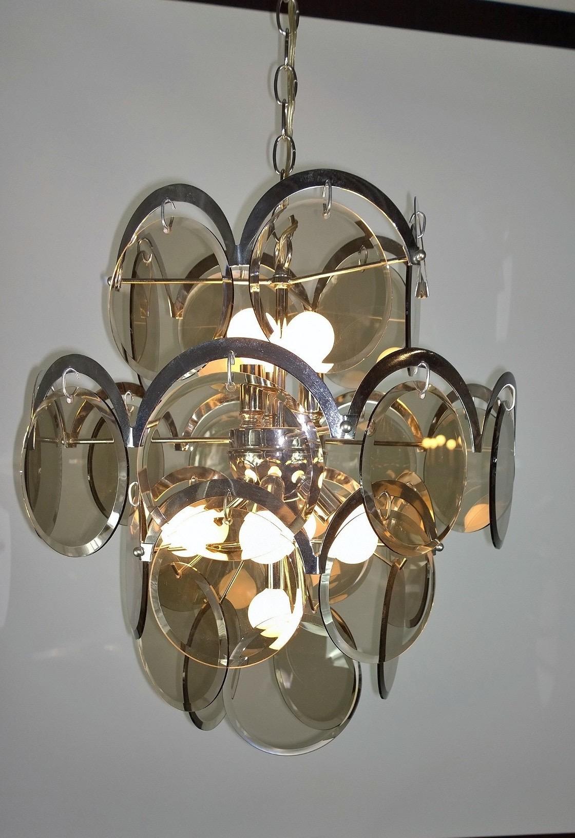 Mid-Century Modern Ten Torchère Multi Smoked Beveled Glass Discs and Chrome Plate Frame Chandelier For Sale
