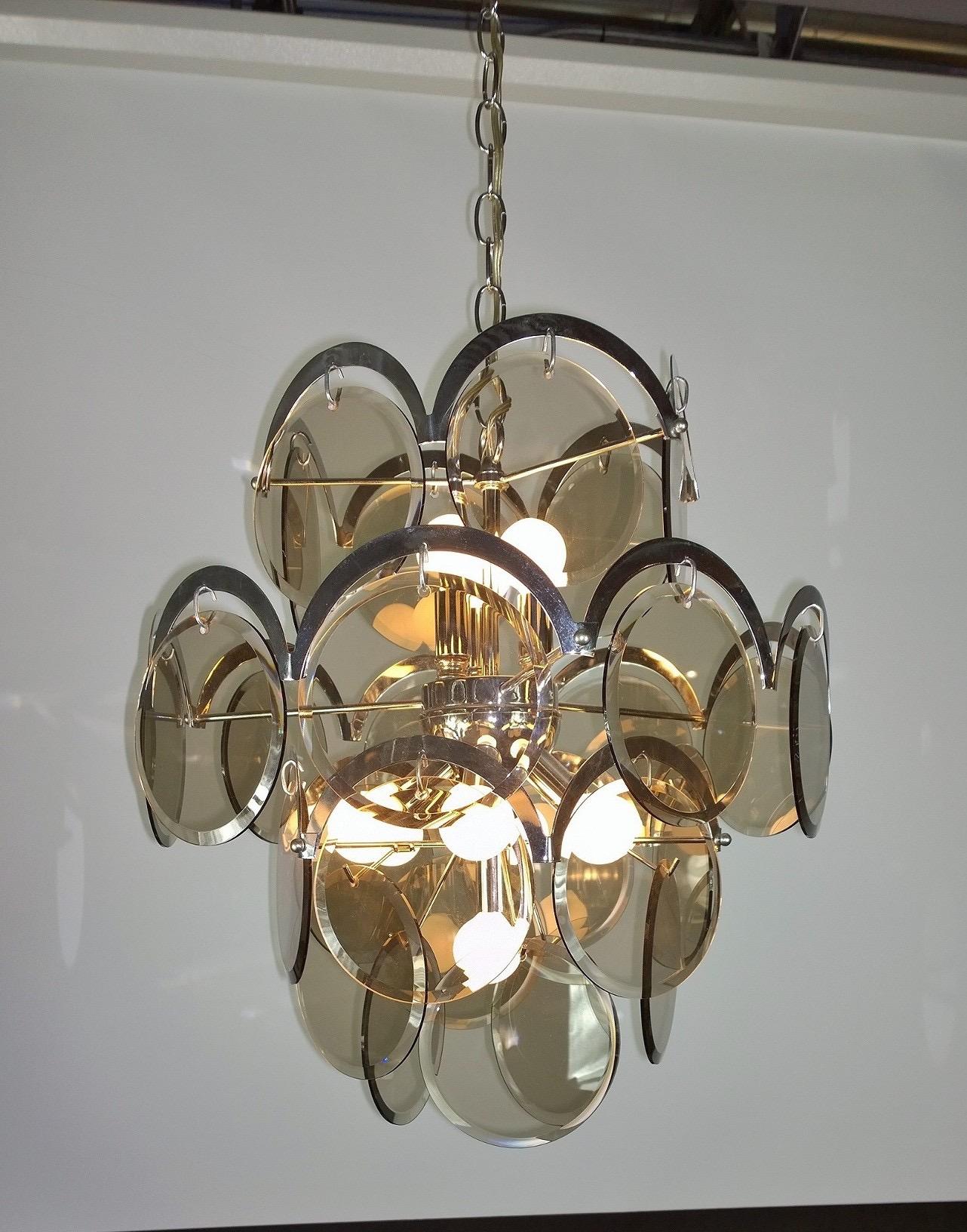Italian Ten Torchère Multi Smoked Beveled Glass Discs and Chrome Plate Frame Chandelier For Sale