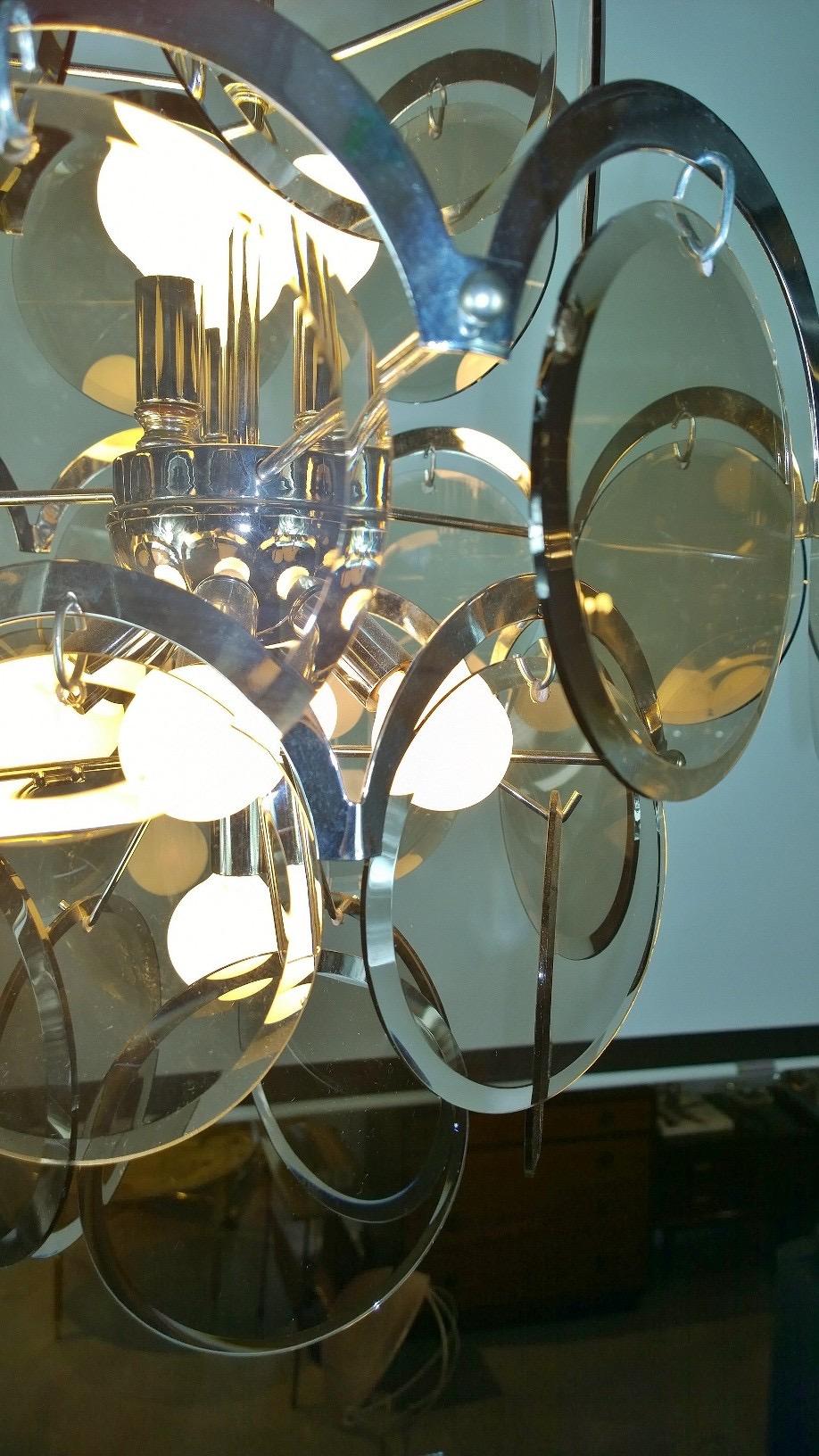 Ten Torchère Multi Smoked Beveled Glass Discs and Chrome Plate Frame Chandelier For Sale 1