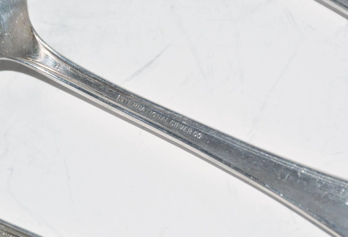 Fatto a macchina Dieci cucchiaini d'argento d'epoca e cinque cucchiai da minestra d'argento d'epoca. in vendita