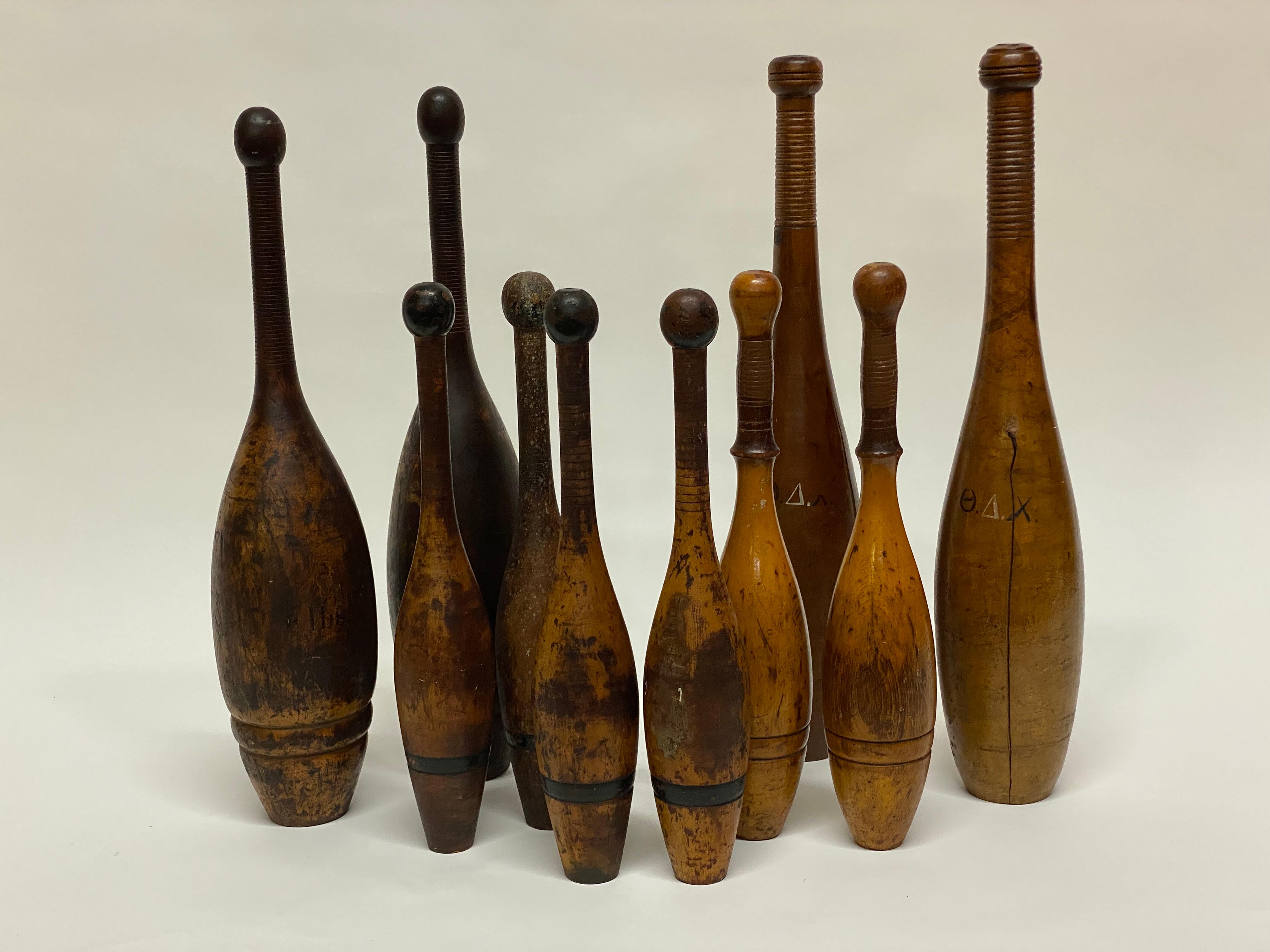 A collection of five pairs of nicely turned Indian Clubs. Ten clubs in total. The heaviest examples are 4 pound and the lighter ones around two pounds. The only set that is signed are four pounds by S.D. Kehoe, Maker, New York. One other set is