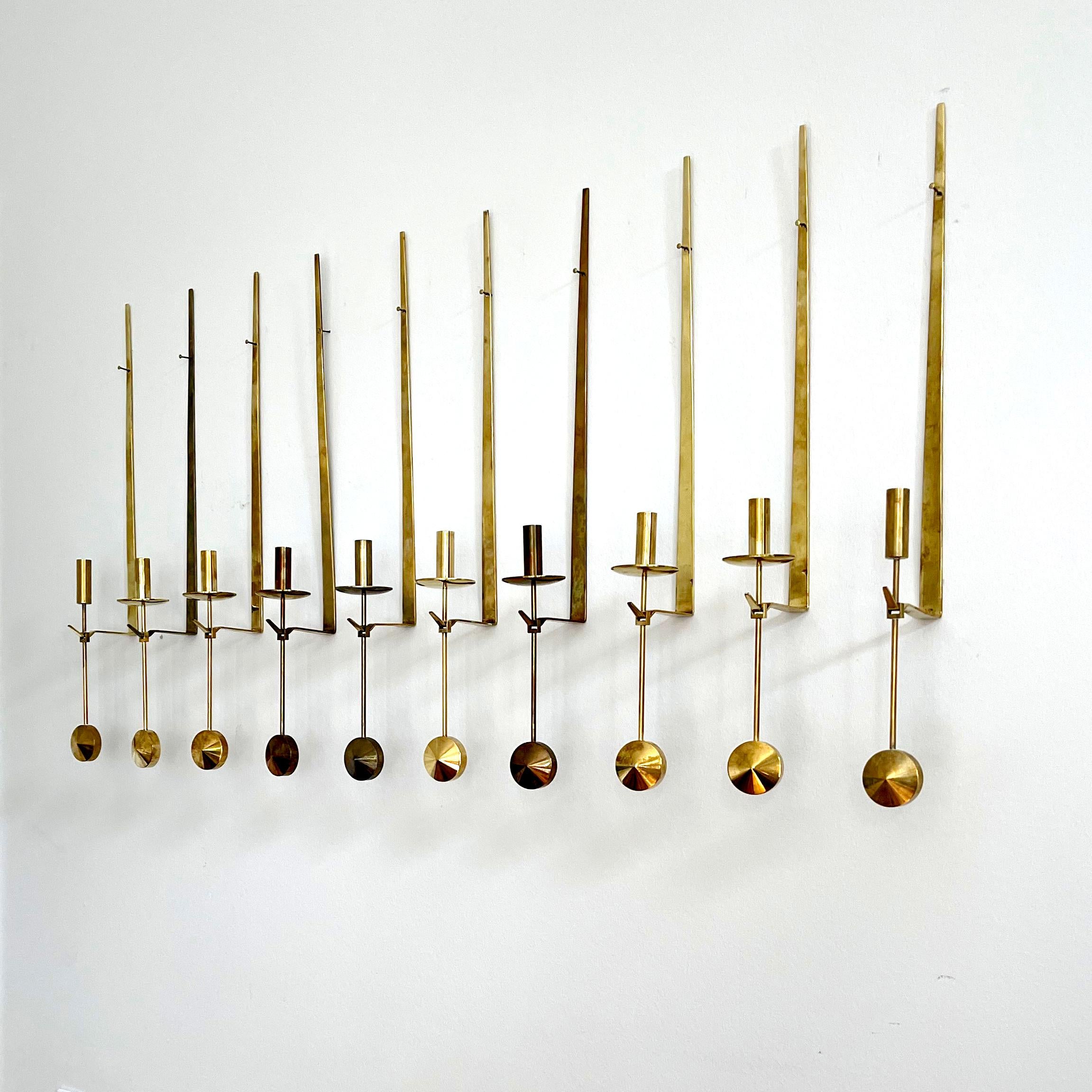 Pierre Forsell & Skultuna - Scandinavian Modern Design

A beautiful and decorative set of 10 wall-mounted candleholders, Pendal no 71, by Pierre Forsell.

Made by Skultuna, Sweden, 1950s. Signed with impressed manufacturer's mark to