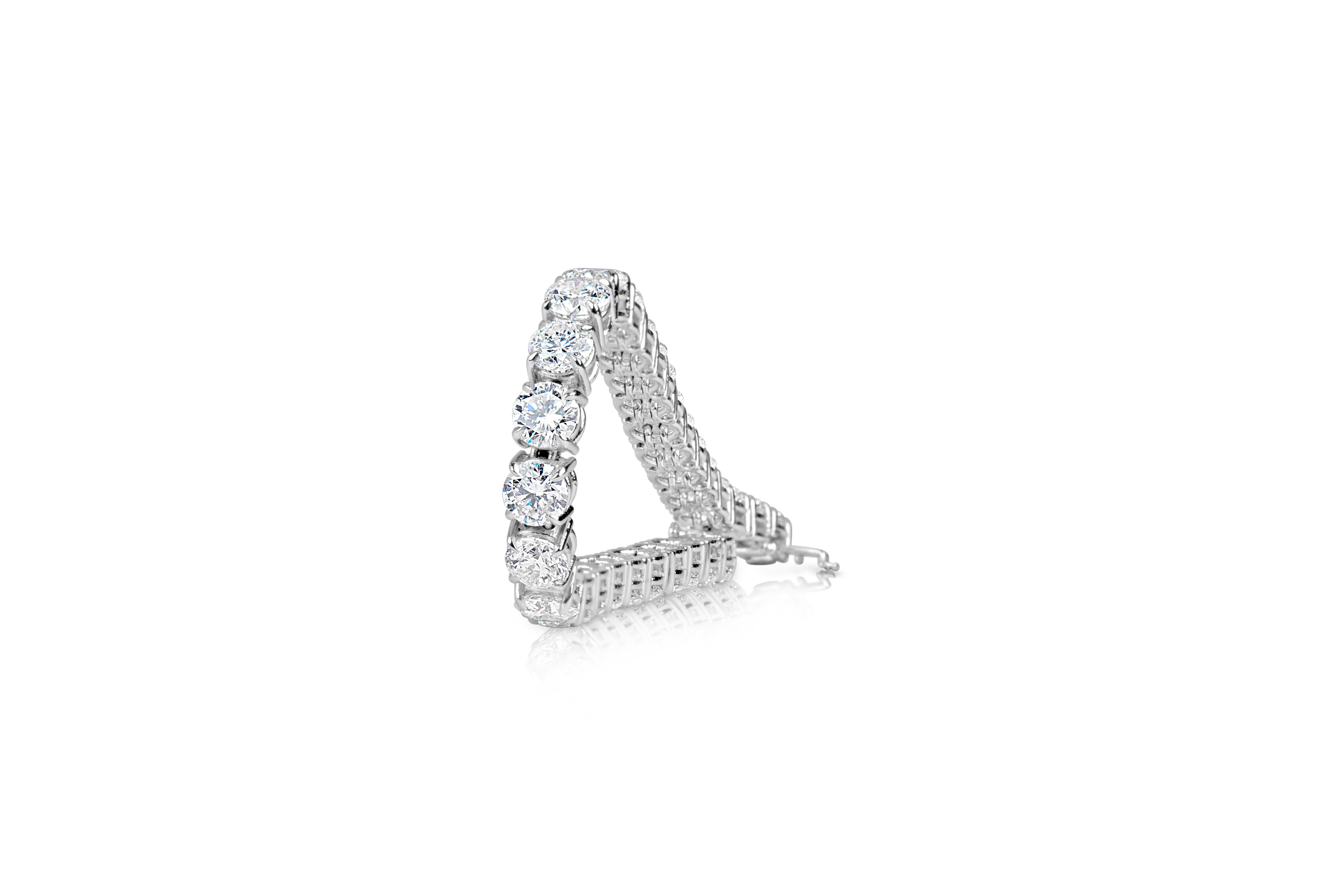 Diamond Tennis Bracelet featuring:
Gold: 18K White Gold
Diamond Count: 33
Diamond Weight: 16 Cts 
We manufacture these tennis bracelets
Minimum 16 Carats, may fluctuate to more weight
DM for more info  
