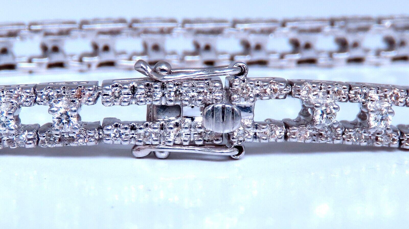 Ladies natural Diamond classic tennis bracelet.

Three Row.

1.75ct Diamonds: H color, vs2 Si1 clarity.

14 karat white gold 17.2 grams

Bracelet measures 5 mm wide

Comfortable pressure clasp and  safety snap.


$7000 appraisal certificate to