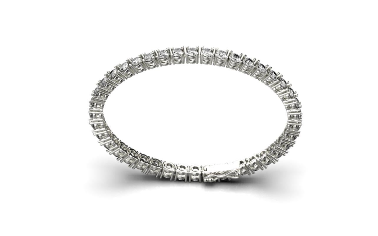 Product Details: 

Introducing our Tennis Bracelet, a refined embodiment of timeless elegance. This bracelet showcases a continuous line of meticulously set diamonds, radiating brilliance and clarity. 

The term “Tennis Bracelet” gained prominence