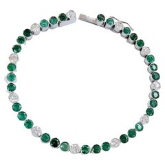 Tennis Bracelet Emerald and Diamond in Platinum