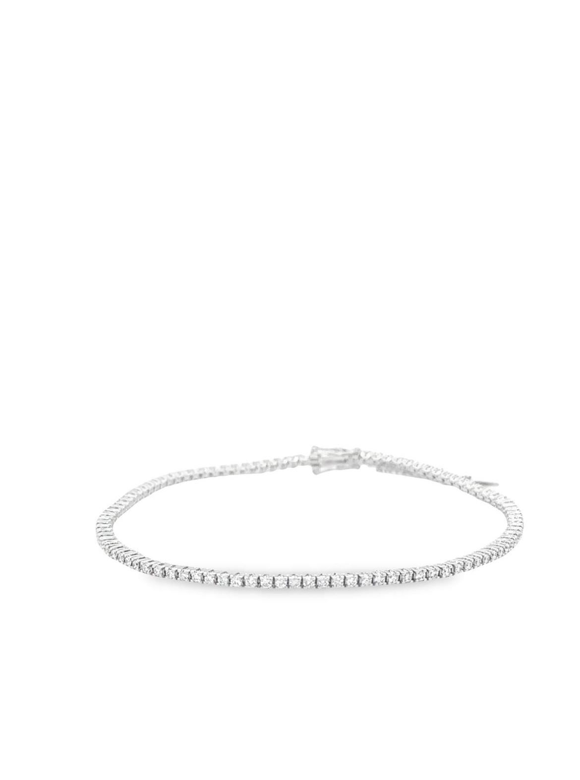 TIMELESS tennis Braclet. 18kt white Gold, 6.20gr with diamonds G color VS clarity in total 6.25ct.

The design of the bracelet is a harmonious blend of classic and contemporary elements, featuring carefully articulated links that offer flexibility