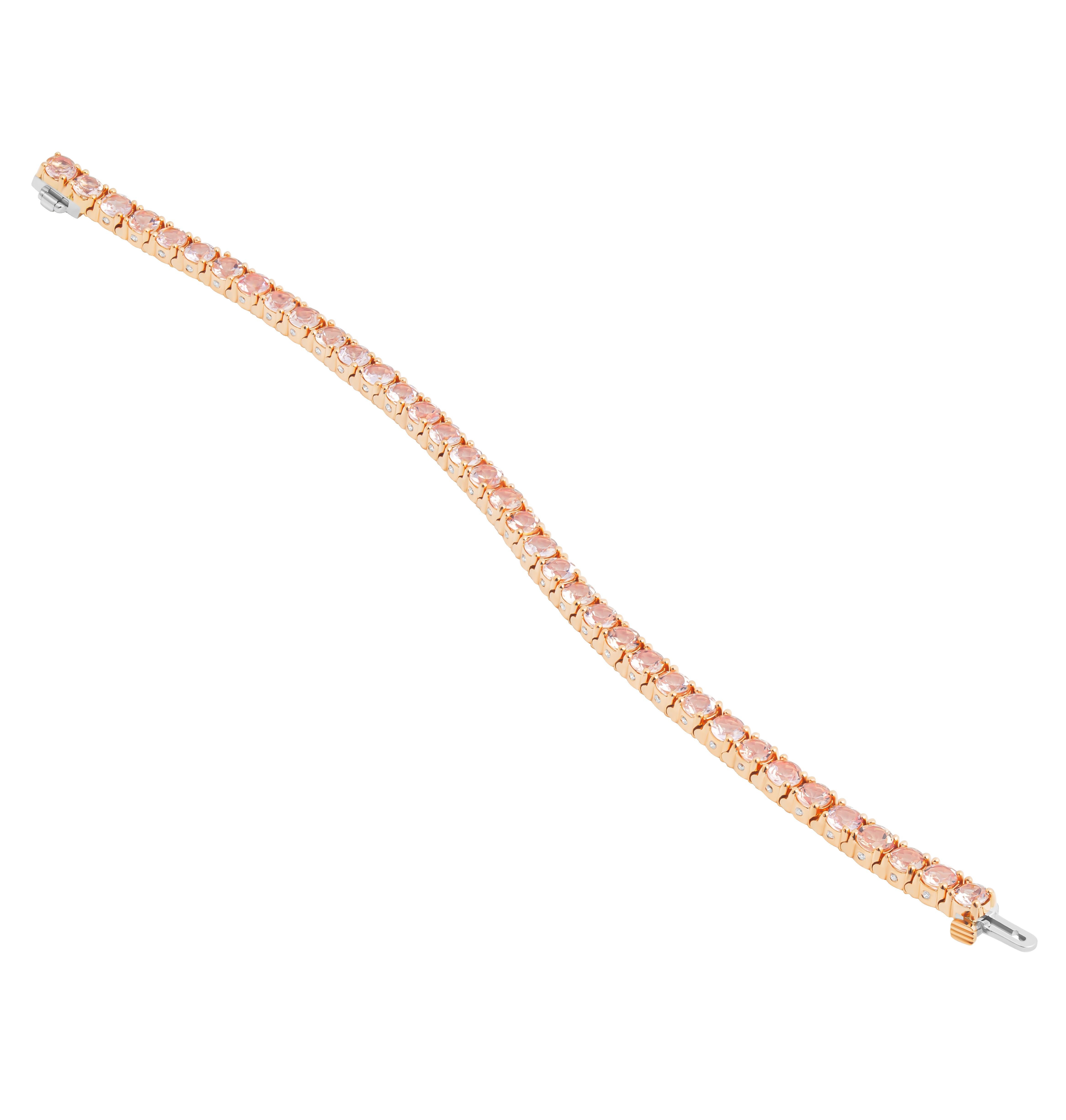 Tennis Bracelet in 14K Rose Gold with Morganites
Tennis bracelet with pave on each basket with round morganites
Length: 6.5”
Pave on setting totaling 0.51ct 
Featuring 37 Round Morganites totaling 7.67ct
