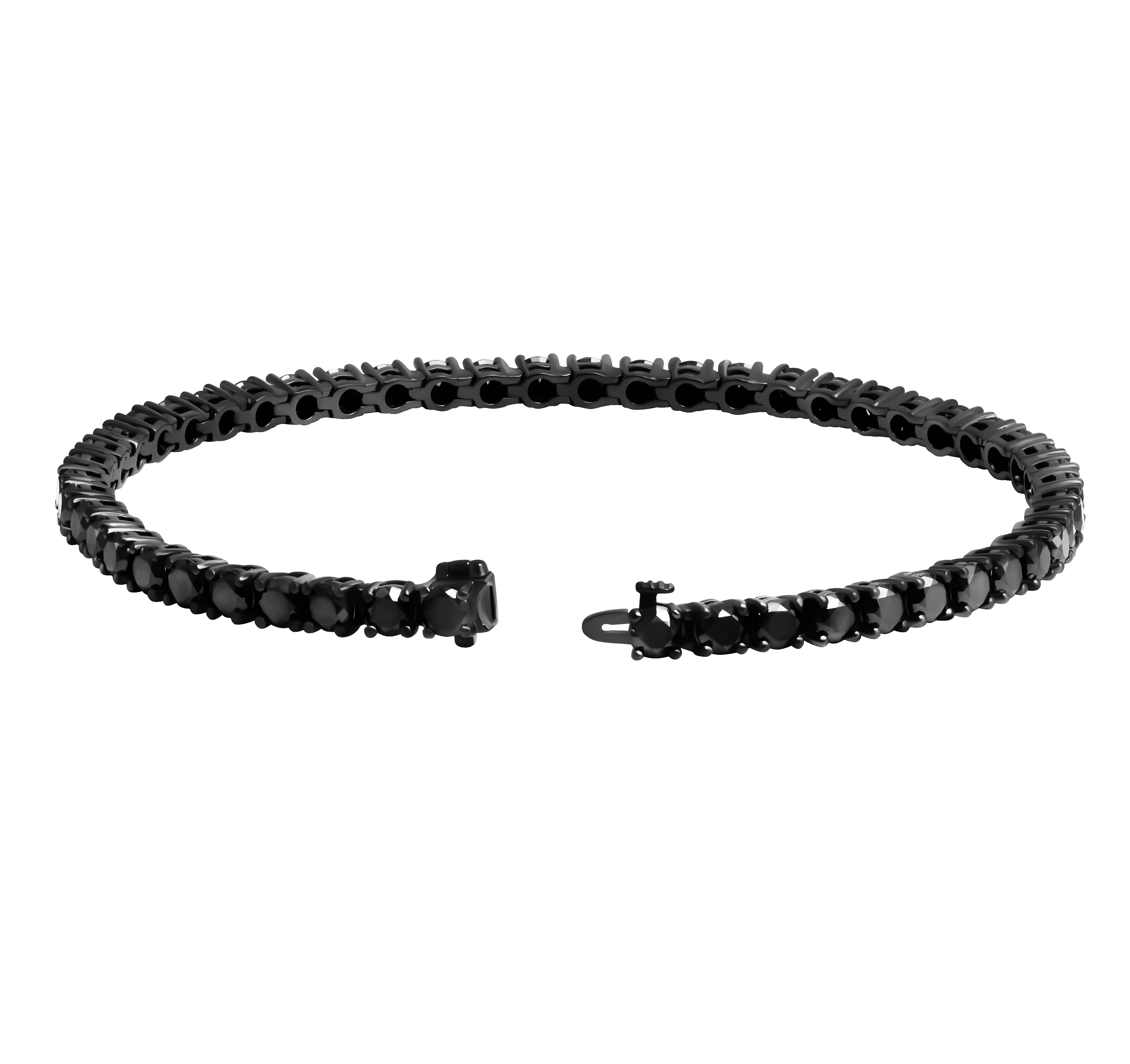 Bracelet tennis en or blanc 14 carats avec diamants noirs
En rhodium noir
Longueur 7