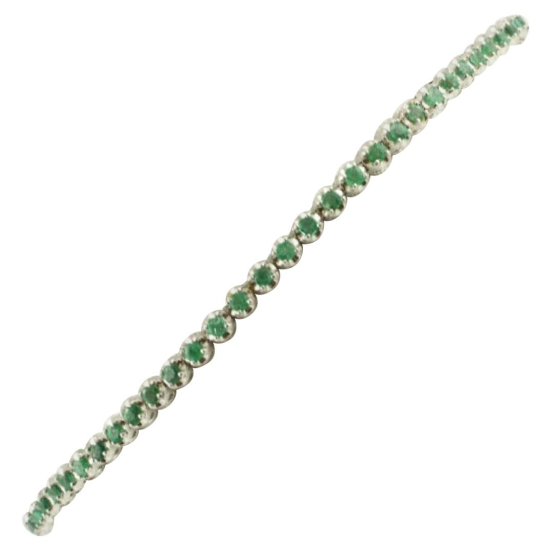 Tennis Bracelet in 18 Karat White Gold and Emeralds