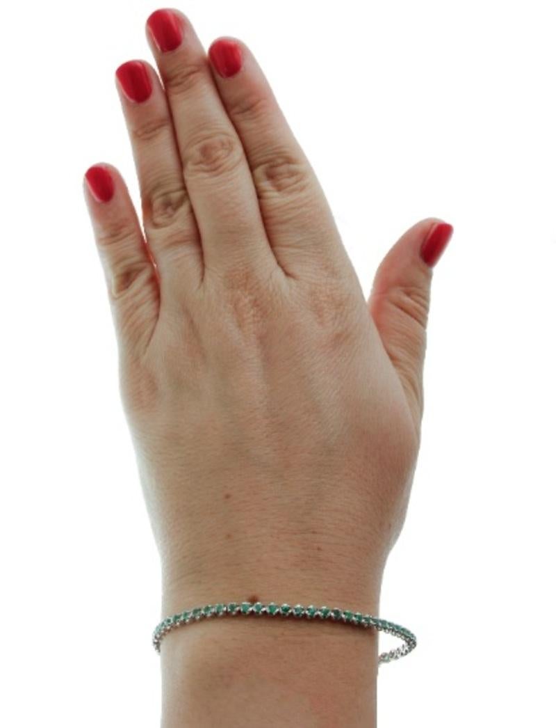 Women's or Men's Tennis Bracelet in 18 Karat White Gold and Emeralds