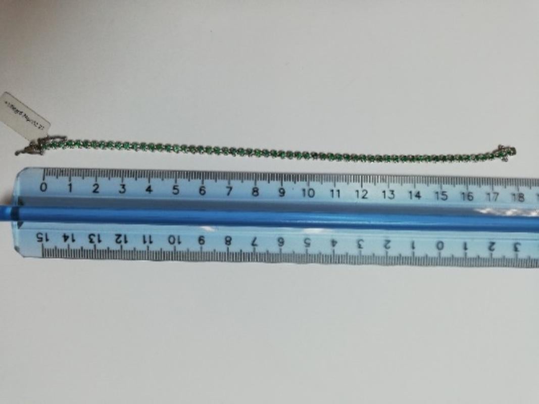 Tennis Bracelet in 18 Karat White Gold and Emeralds 2