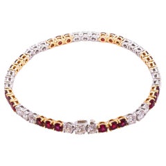 Tennis Bracelet in 18K Yellow Gold & Platinum with Diamonds and Ruby's 
