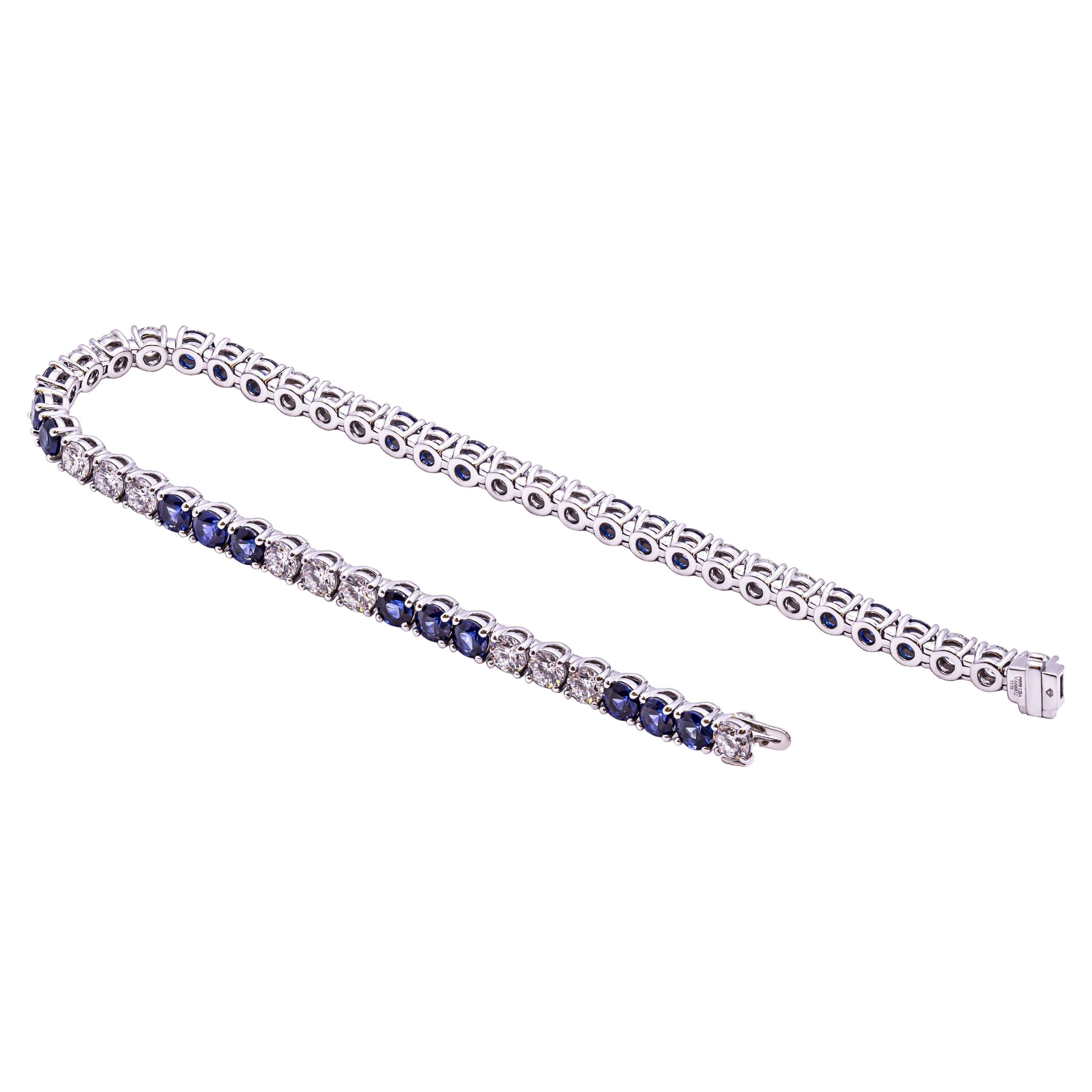 Introducing our Platinum Tennis Bracelet, a dazzling fusion of sophistication and style. Elevate your look with this exquisite piece, featuring a meticulous alternation of 49 round stones, each boasting 0.14 carats of pure brilliance. Crafted in