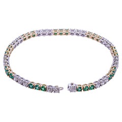 Used Tennis Bracelet in Platinum with Diamonds and Green Emeralds 