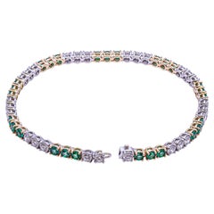 Bracciale Tennis in Platino con diamanti e smeraldi verdi