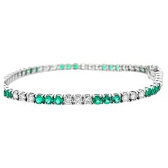 Bracelet tennis en or blanc 14 carats, diamants blancs 2,09 carats et émeraude verte 3,20 carats 