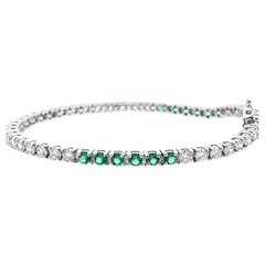 Bracciale Tennis Diamanti bianchi 4,41 CT & Smeraldo verde 1,76CT in oro bianco 14K