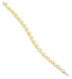 Tennisarmband mit abwechselnd gelben ovalen und weißen runden Fancy-Diamanten