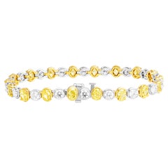 Tennis Bracelet with Alternating Fancy Yellow Oval and White Round Diamonds