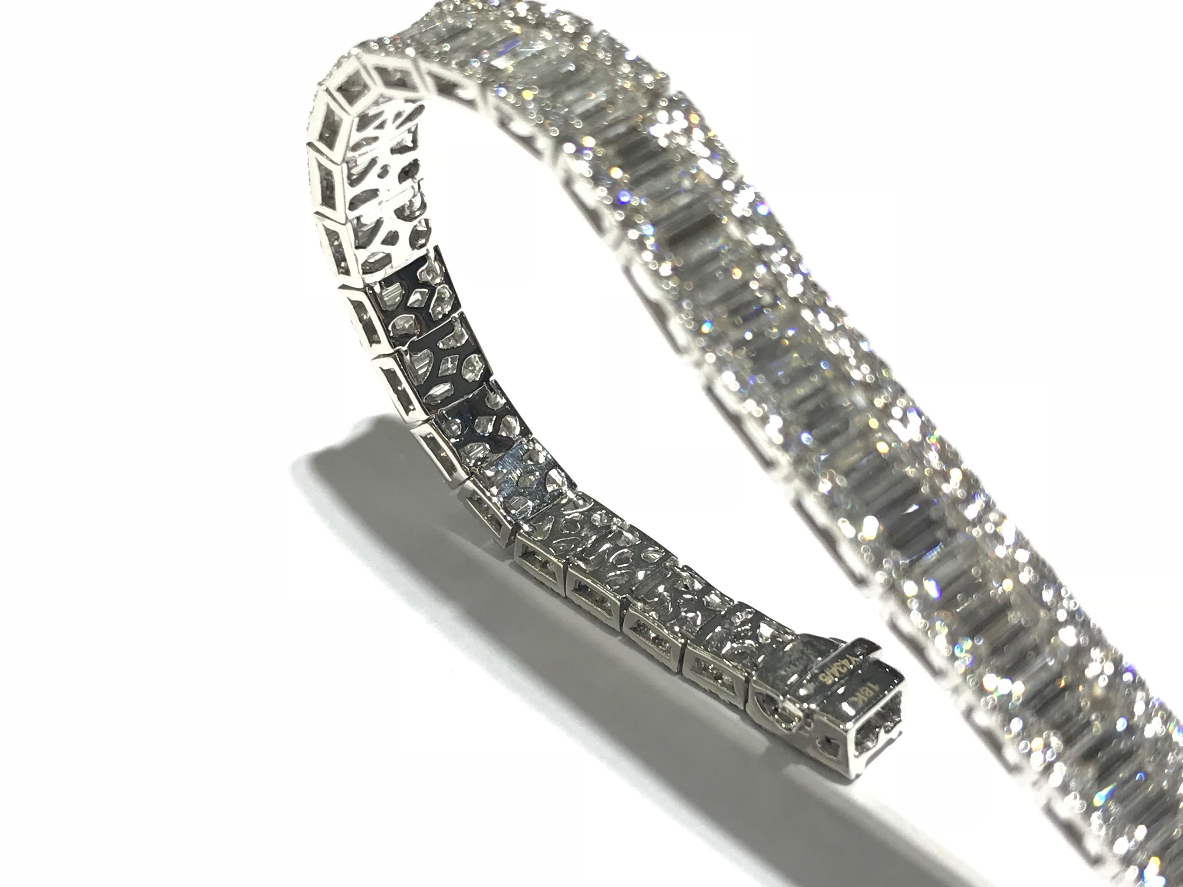 Tennis Bracelet with Baguettes and Round diamonds on each side 
5.60 carat baguettes 
2.71 carat round diamonds on each side 
VS clarity F colour 
