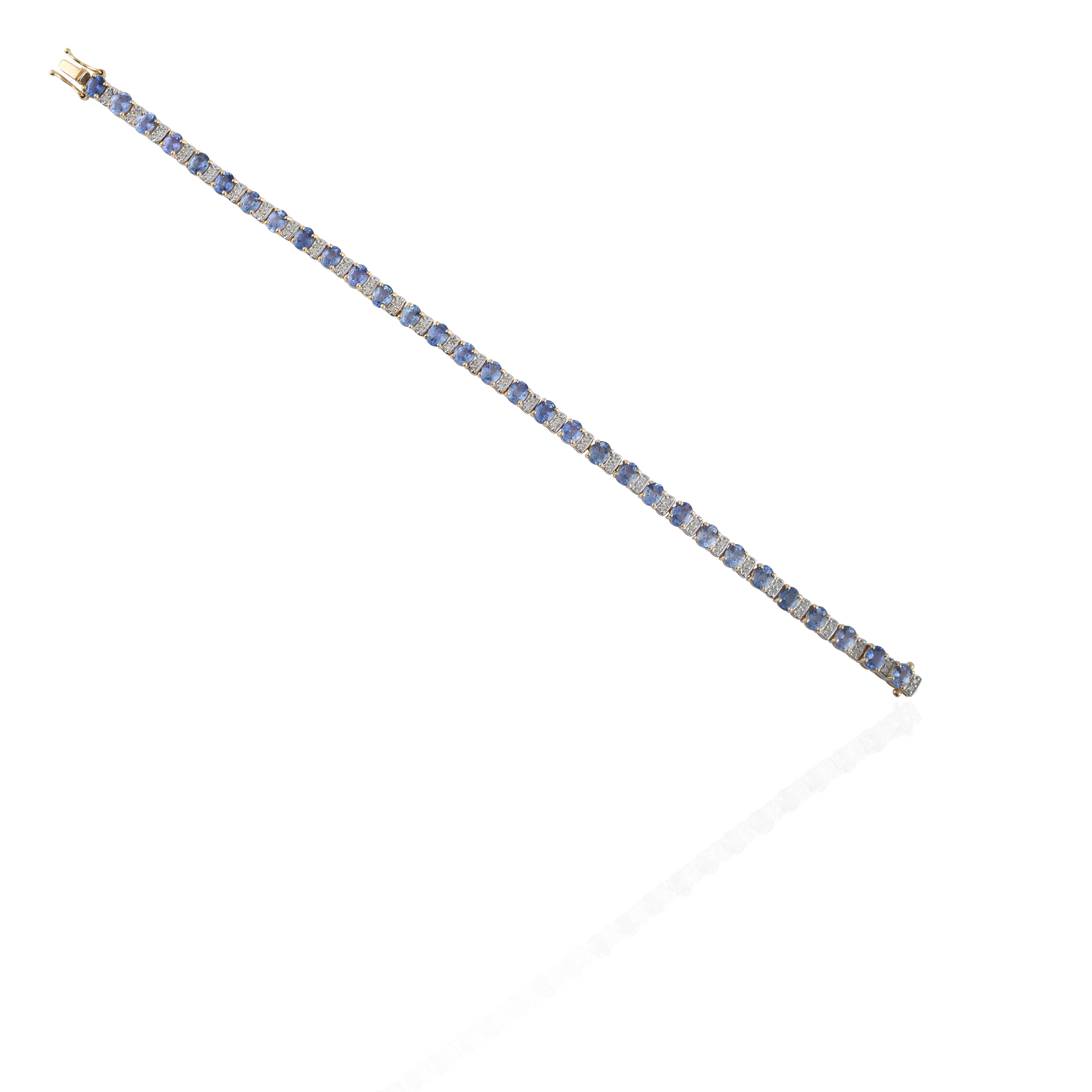 Art Deco Tennis Bracelet with Blue Sapphire and Diamonds Set in Solid 14k Yellow Gold For Sale