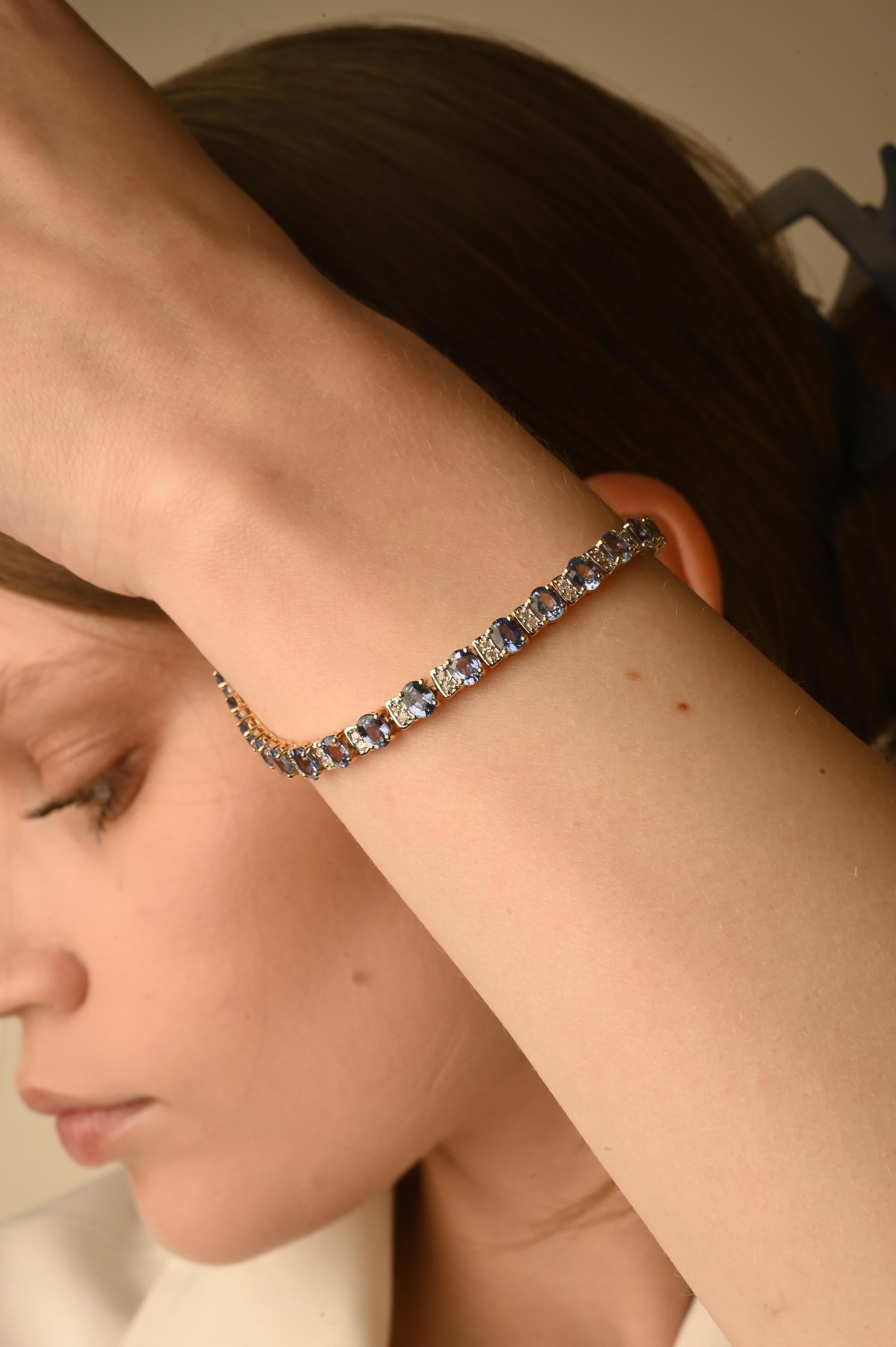 Oval Cut Tennis Bracelet with Blue Sapphire and Diamonds Set in Solid 14k Yellow Gold For Sale
