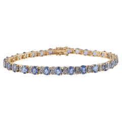 Tennis Bracelet with Blue Sapphire and Diamonds Set in Solid 14k Yellow Gold