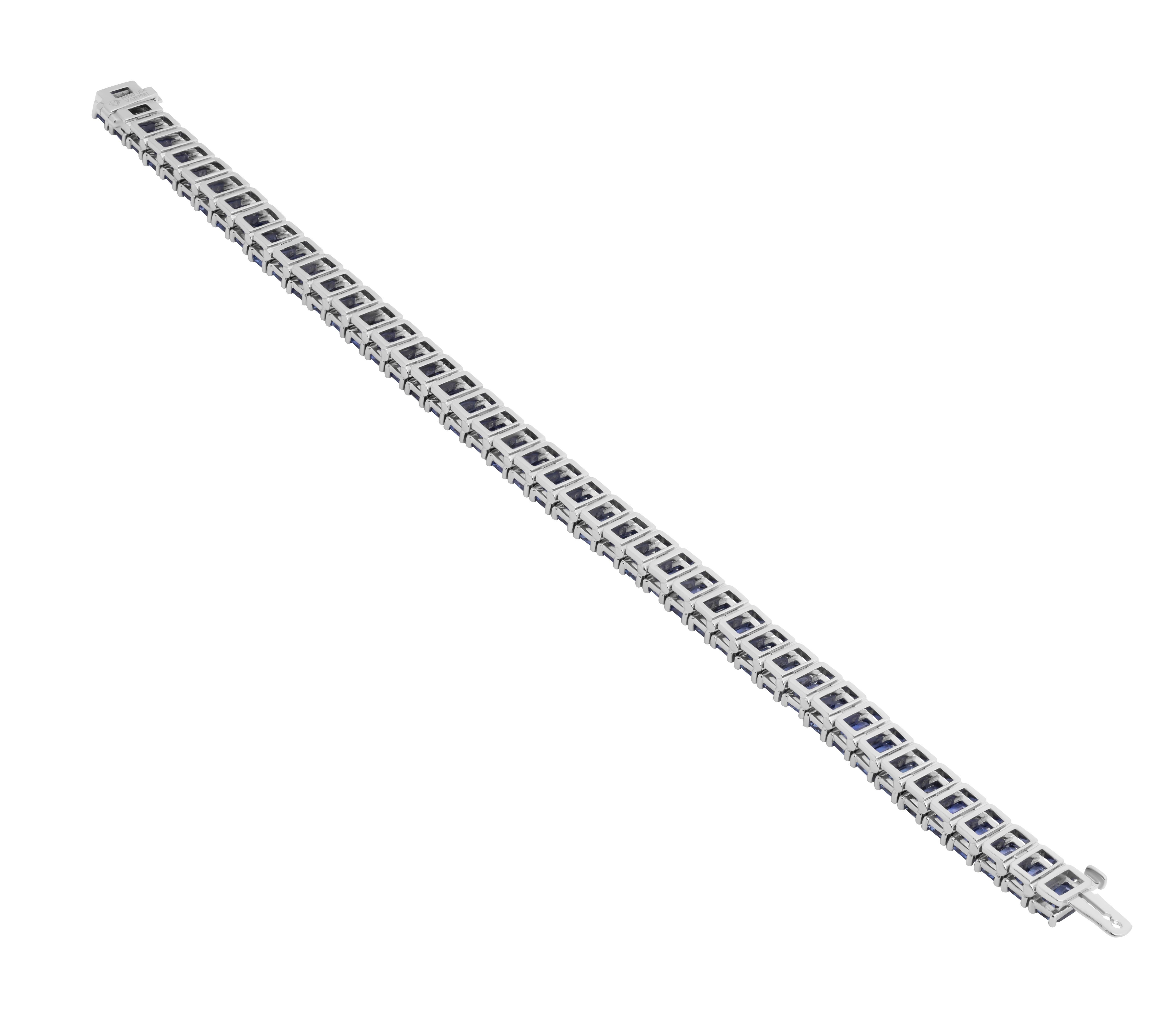 Tennis Bracelet with Emerald cut Blue Sapphires
Sapphires totaling 21.51ct - 45 stones
Length 7''


