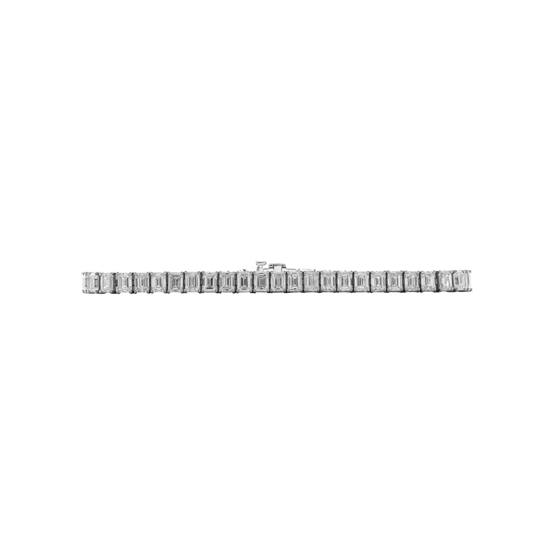 Tennis Bracelet with GIA Certified Emerald cut diamonds in Platinum
50 stones: 0.30ct each
TCW: 15.22ct
7” long 
Each stone: 
0.30 F VS1 GIA#5473103237
0.30 F VS1 GIA#6471091295
0.30 F VS1 GIA#6471279877
0.30 F VS1 GIA#7476055880
0.30 F VS1