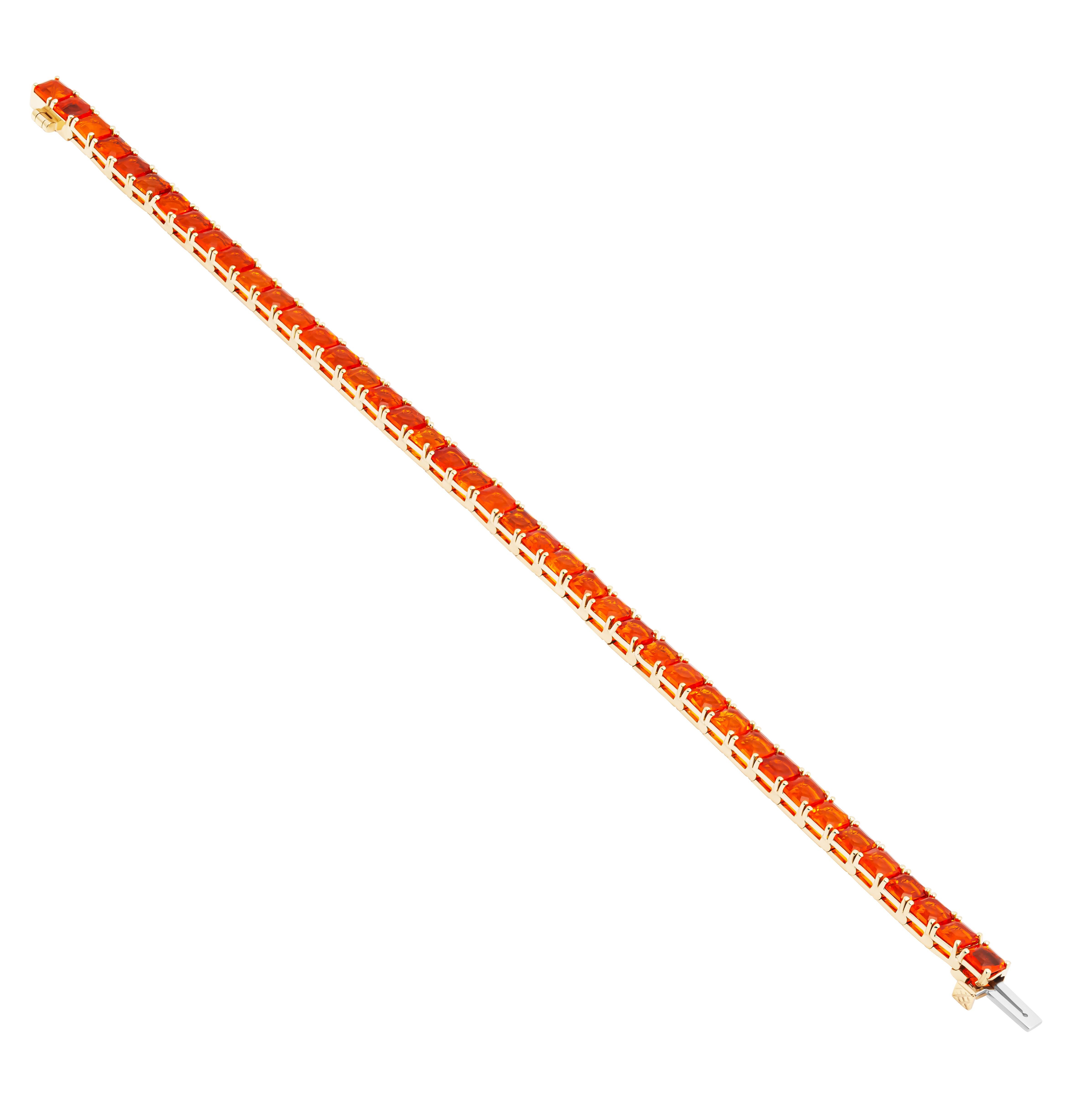 Tennis Bracelet with Mexican Fire Opals in 14k yellow gold
Length: 7”
42 Fire Opal Asscher Cuts 
Totaling 11.34CT
