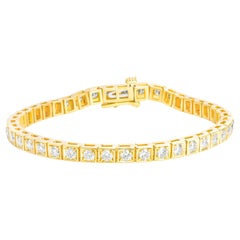 Bracciale tennis con diamanti rotondi in oro giallo 14 carati