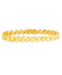 Tennis Bracelet with Slanted Fancy Light Yellow Pear Shape Diamonds